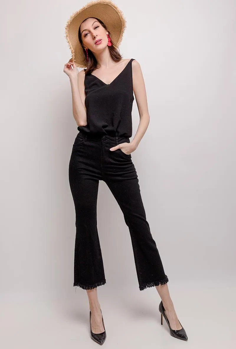 Flared pants with raw edges